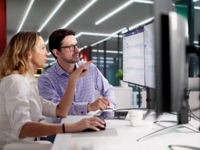Man Using HR Software To Screen Interview Candidates For Talent