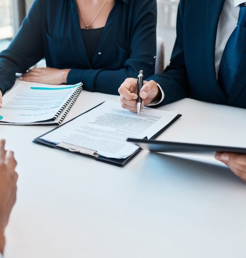 Business people, legal team and contract sign meeting, lawyer consulting and documents planning in office. Closeup hands, company tax audit and hiring application with attorney, hr and recruitment.